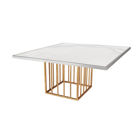 Mesa cubo herrería dorada y cubierta calacata