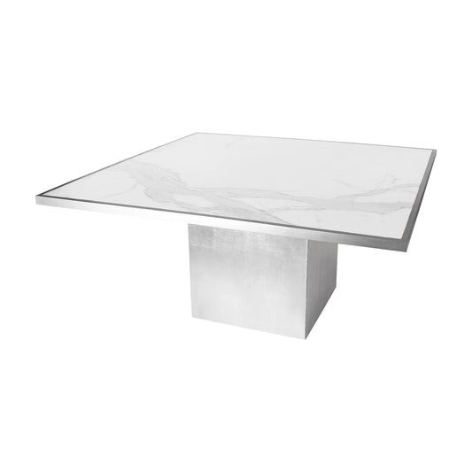 Mesa cubo plata óxido y cubierta calacata